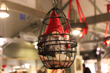 Christmas gnome in a cage