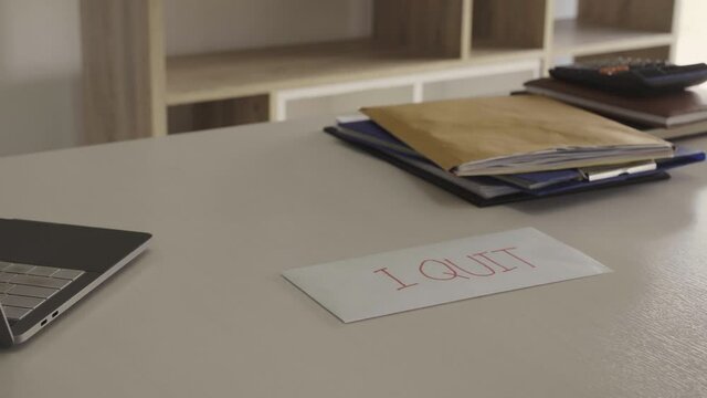 Business people giving a resign letter to quit a job at office.
