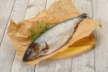 Salted herring over the wooden board