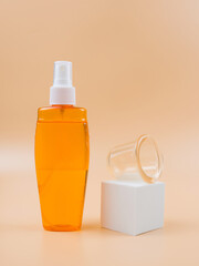 Anti-cellulite oil and silicone jar for vacuum massage.