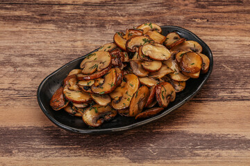 Roasted champignon with herbs and spices