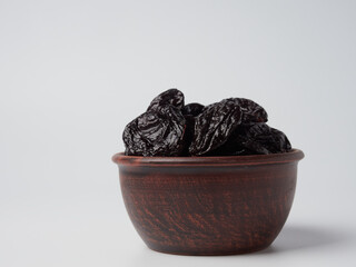 Dried plum - prunes isolated on a white background