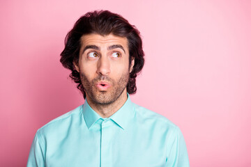 Photo of young handsome dreamy man think curious imagine plan look empty space isolated over pink color background