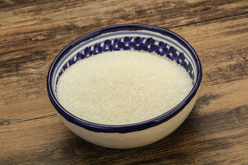White sugar in the bowl