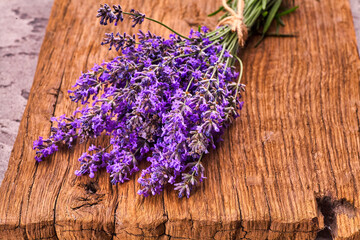 Bunch of Lavender flowers on wooden board