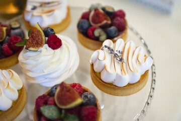 beautiful stylish and delicious sweet desserts. candy bar. wedding celebrations