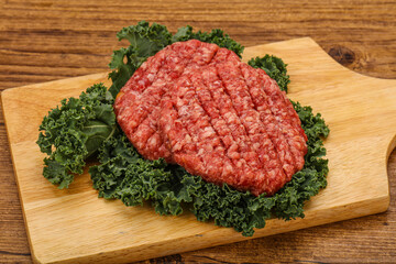 Raw beef burger cutlet for cooking