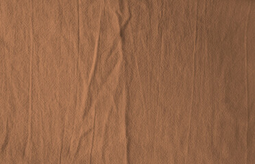 Fototapeta na wymiar Brown rippled cotton fabric texture background
