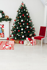 White room Christmas tree pine with gifts new year interior decor