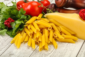 Raw penne rigate for cooking