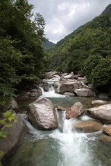 View of creek and waterfall at Dazhang mountain, Crouching Dragon valley, (Chinese: Dazhangshan, Wolonggu), Wuyuan county, Jiangxi Province, China