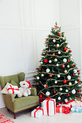 December Christmas tree pine with gifts new year interior decor