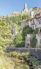 Fototapeta premium Giovenco river below Piccolomini tower, Pescina, Abruzzo, Italy