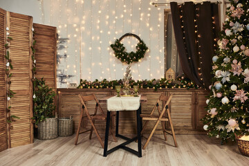 Christmas interior of the kitchen. Christmas and New Year decorate the interior of photostudio