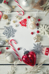 Christmas postcard on a light wooden surface