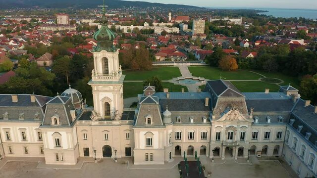 Keszthely, Hungary - 4K drone flying away from the Festetics Palace (Festetics Kastely) at autumn season. The town of Keszthely has been located in Zala county at Lake Balaton