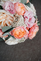 Wedding bouquet of roses. French rose. Ranunculus. Hibiscus