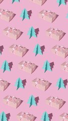 Creative Christmas pattern made of gift box and paper pine tree and trend shadows on pastel pink background. Minimal December New Year concept. Flat lay.