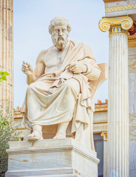 Plato statue, the ancient Greek philosopher sitting in deep thoughts, Athens Greece