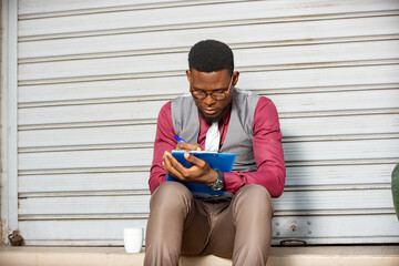 young businessman with a note book