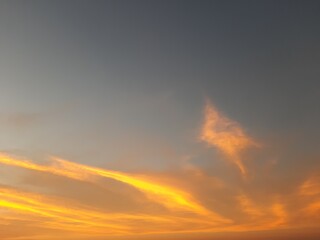 Nature's Own Painting With Streaks of Orange & Yellow Clouds