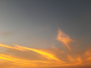 Nature's Own Painting With Streaks of Orange & Yellow Clouds