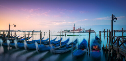 Venice lagoon, San Giorgio church and gondolas at sunrise. Italy © stevanzz