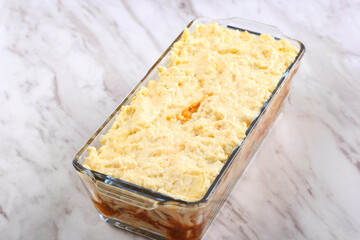 Selected Focus Preparation in the Kitchen, Step By Step Making Baked Spaghetti or Spaghetti Brulee. Add Bechamel Sauce to the Spaghetti and Bolognaise Sauce Layer