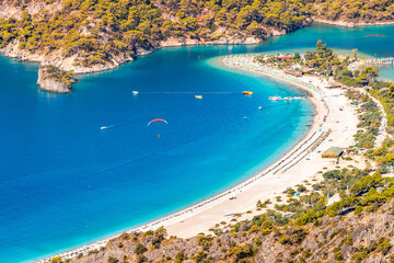 Obraz premium famous and popular Turkish resort town of Oludeniz, aerial view of a fantastic sand bar and a bay with turquoise water. Vacation and beach holiday concept