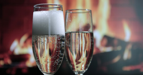 Pouring champagne into a glass.