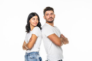 Portrait of smiling couple back to back.Isolated on white background
