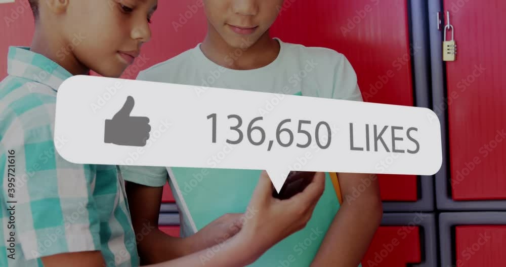 Poster speech bubble with thumbs up icon and increasing numbers against two boys using smartphone
