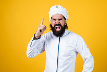 handsome angry guy with beard and moustache raise finger, idea