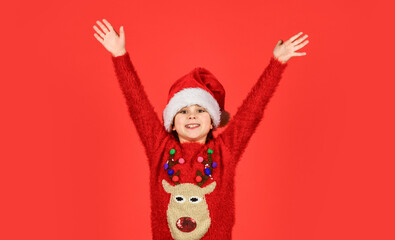 Can not hold back emotions. Christmas holiday invitation. Adorable girl wear santa claus hat red background. Emotional face expression. Happy childhood. Counting days till christmas. Christmas party