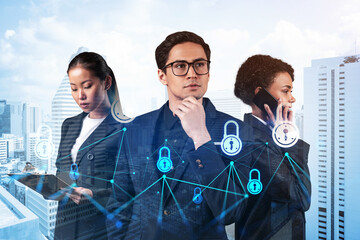 Group of business colleagues as a part of multinational corporate team working on project to protect clients information at cybersecurity compliance division. IT lock icons over Bangkok
