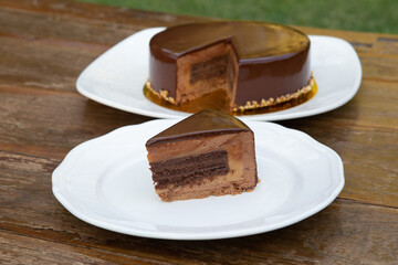 Delicious cake with three different kind of chocolate.