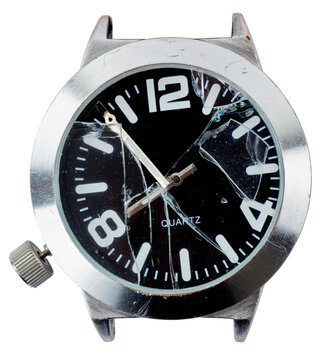 Wristwatch with broken glass. Studio photo isolated on xx background. Selective focus on object.