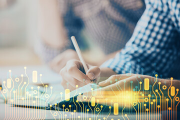 Writing man's hands background with technology icons.