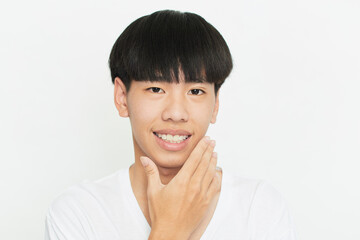 Closeup portrait of attractive young man face