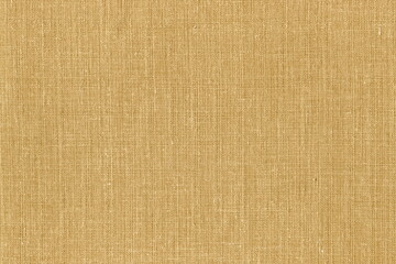 Fototapeta premium Texture of coarse natural linen fabric of natural warm color. Light brown burlap.