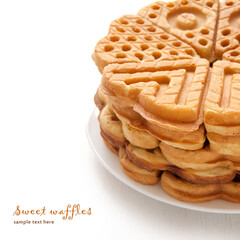 Cookies waffles in the shape of heart on white background.