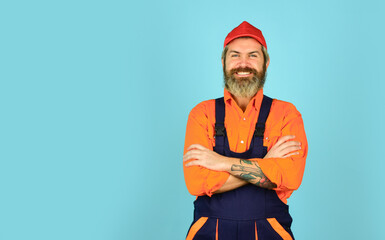 Handsome construction worker. Fixing broken technics at home. Electrician plumber handyman. Call master. Renovation concept. Man skillful worker. Laborer. Repairman experienced worker. Help services