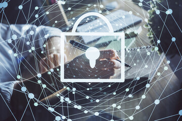 Double exposure of woman's hands writing with lock icon. Concept of security and protection of data