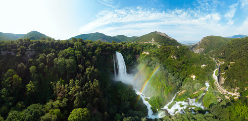 Aerial view. Water discharge, strong, maximum flow. Rainbow. The Cascata delle Marmore is a the...