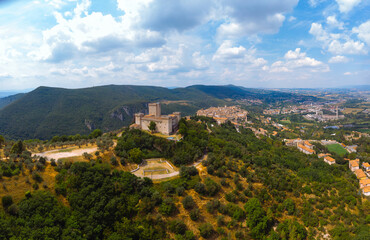 Fototapeta na wymiar Aerial view of Albornoz fortress. Narni. Umbria. Italy. Summer sunny day. Concept of travel and vacation in Europe. Castle on top of the mountain