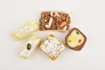 Indian festival food isolated on white background, kaju pasta tool, doda,  and kaju anjeer barafi