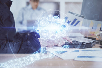 Multi exposure of tech drawings with man working on computer background. Concept of innovation.