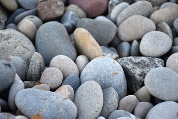 Quality photographic image. Image of beach pebbles. Texture image to decorate.