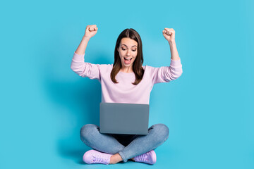 You pass university exam. Full length girl sit floor legs crossed study remote laptop win education...