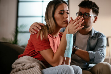 Young woman waiting results from the laboratory. Worried woman waiting Covid-19 test.